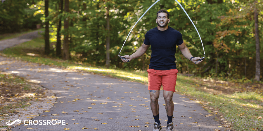 woman jumping rope outside to experience the benefits of jumping rope