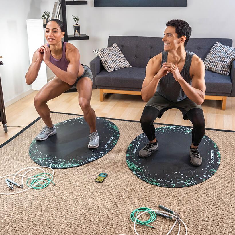 Jump Rope Mat (Splash) Athletes working out with Crossrope Jump Ropes and the Crossrope LE Mat