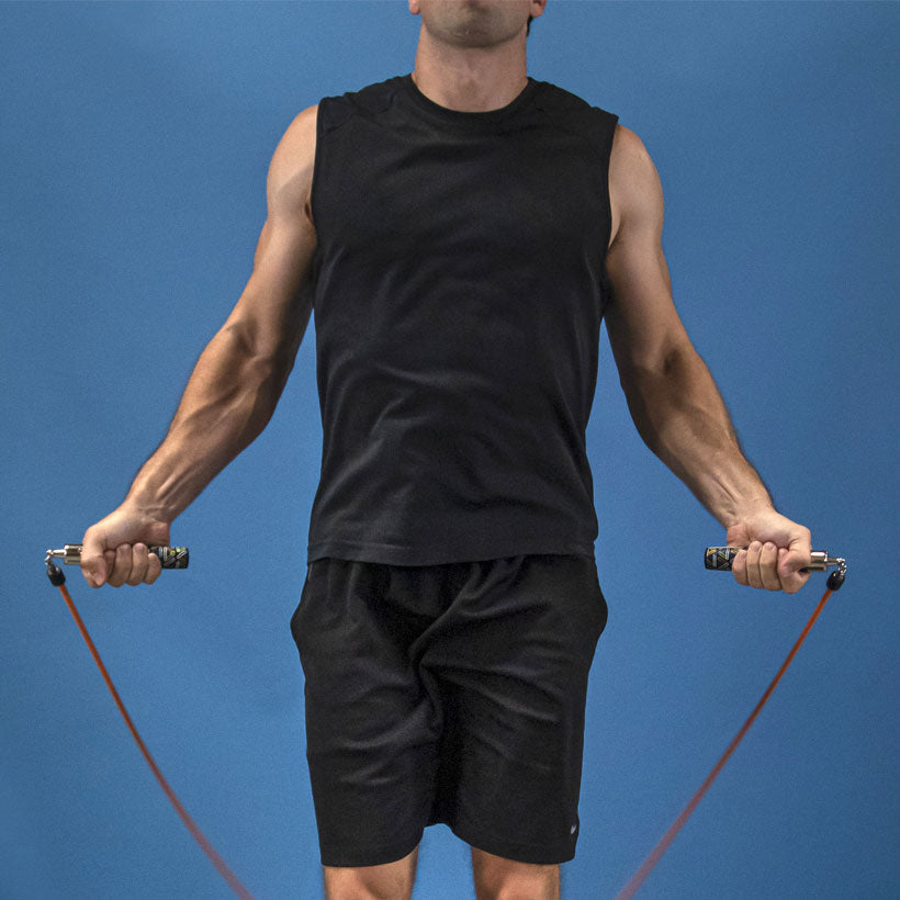 Speed Pro Performance Set (2022) Man jumping with a 1 LB Speed Pro rope with Speed Pro LE handles